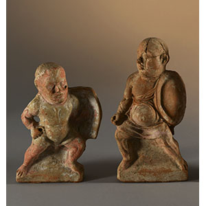 Due statuette grottesche di gladiatori
