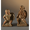 Due statuette grottesche di gladiatori